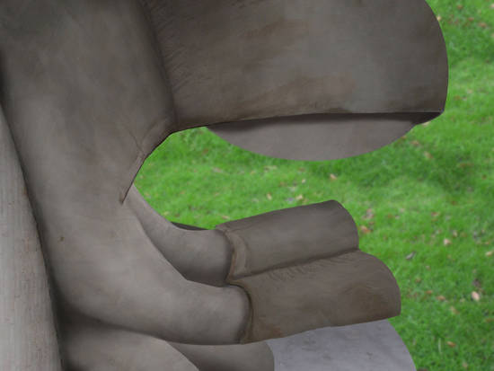 Statue Reading in Park