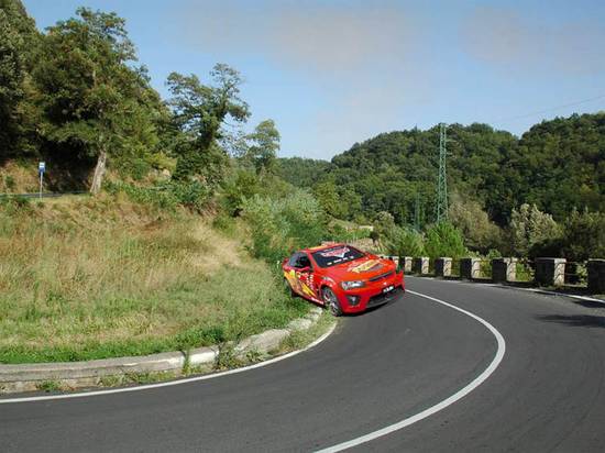 curvy road with car