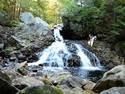 Jumping into waterfall